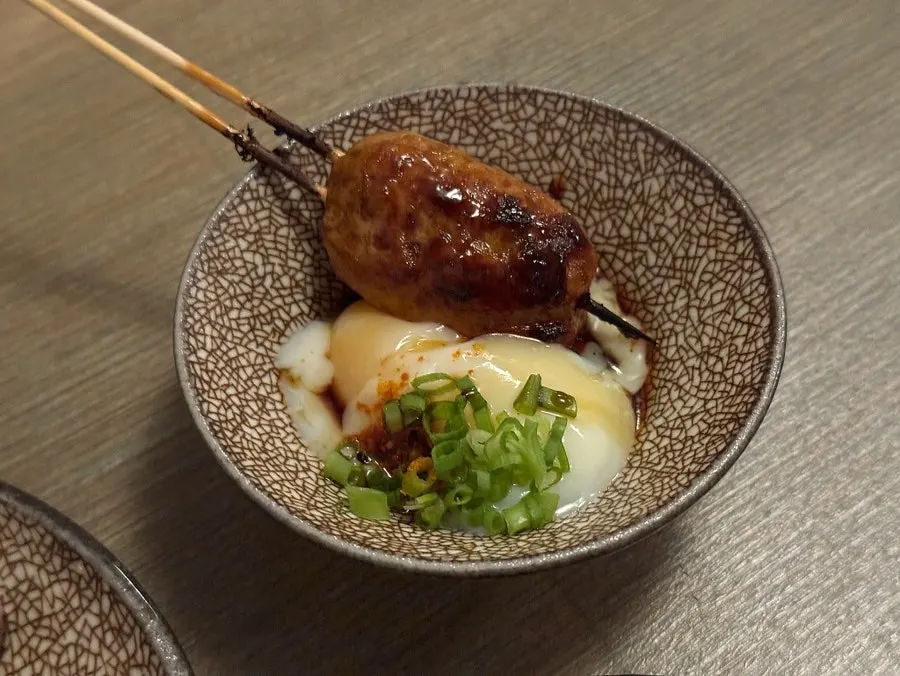 Tsukune with poached egg and complimentary grilled chicken cartilage