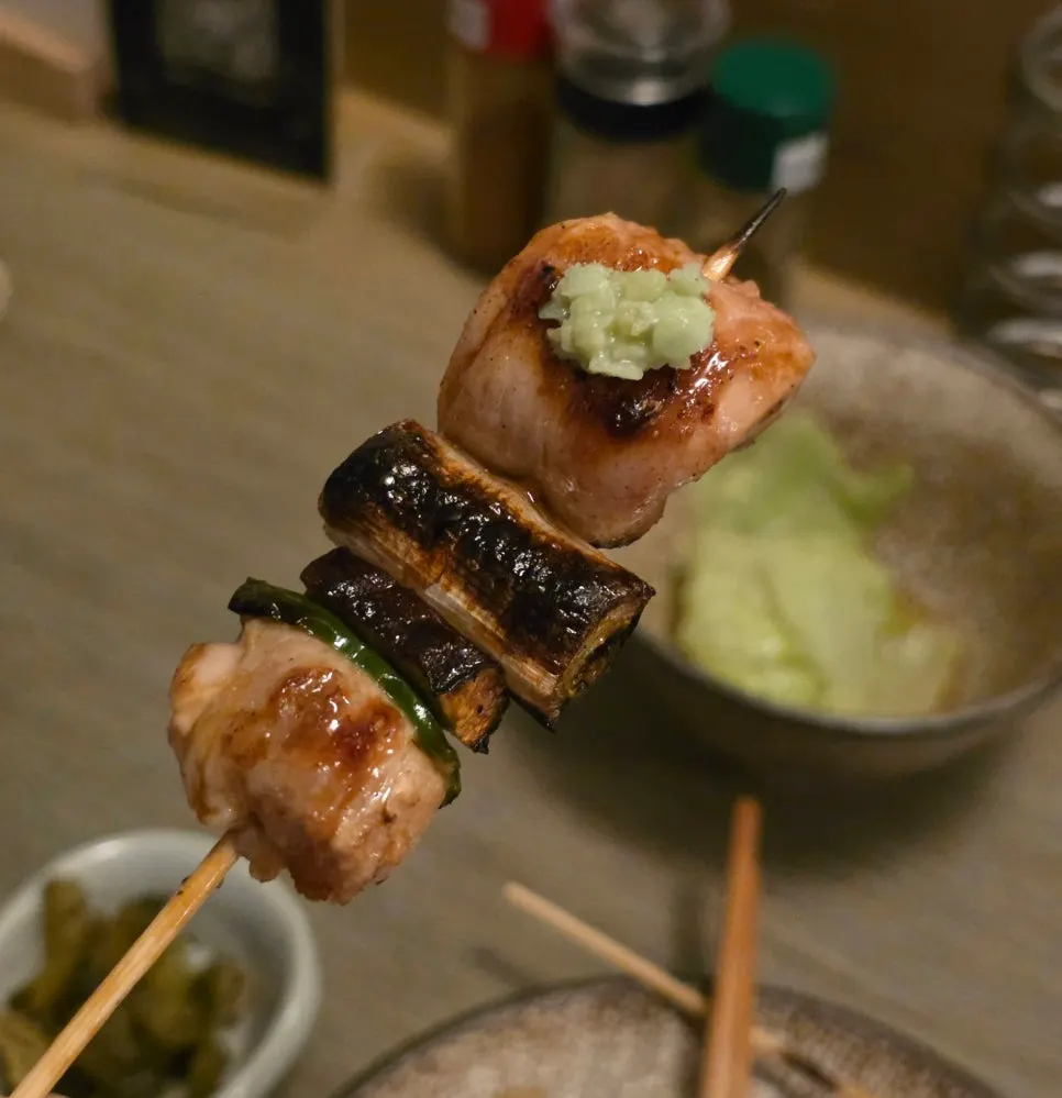 Skewer of tare-glazed whole chicken thigh