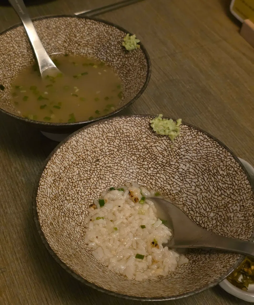 Chicken gomtang broth with grilled rice inside