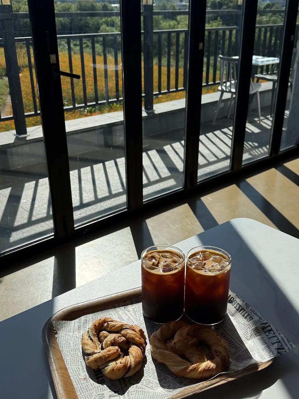 Brunch table with a cosmos-field view