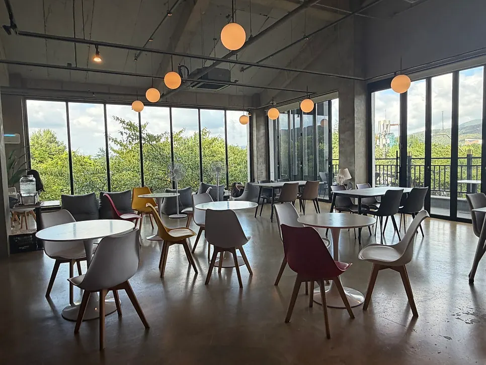 Window-side seats by Yard café's floor-to-ceiling windows