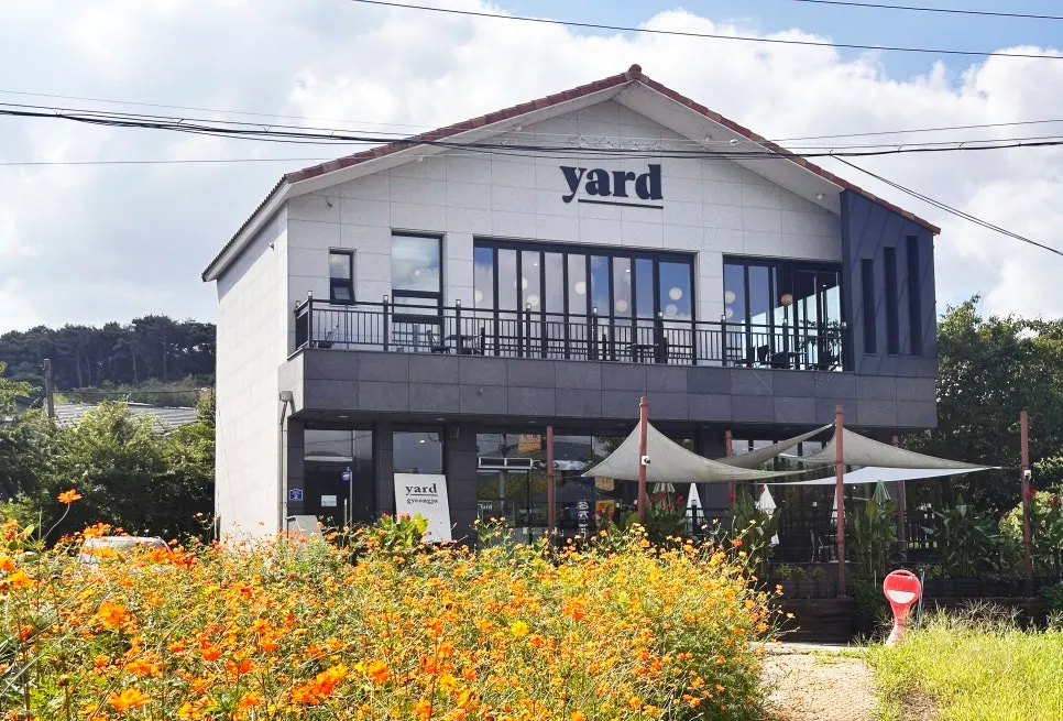 Yard exterior with a flower field