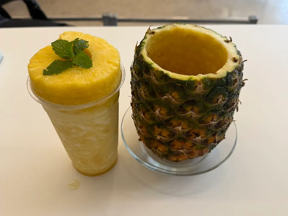 A glass of fresh fruit smoothie on the table