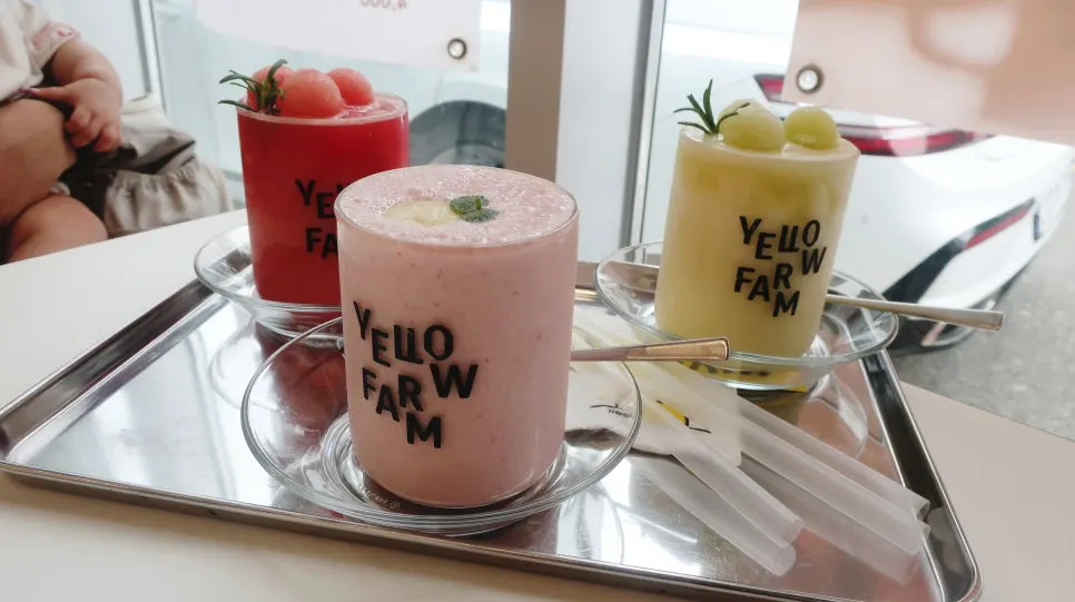 Three fresh fruit smoothies ordered at the table