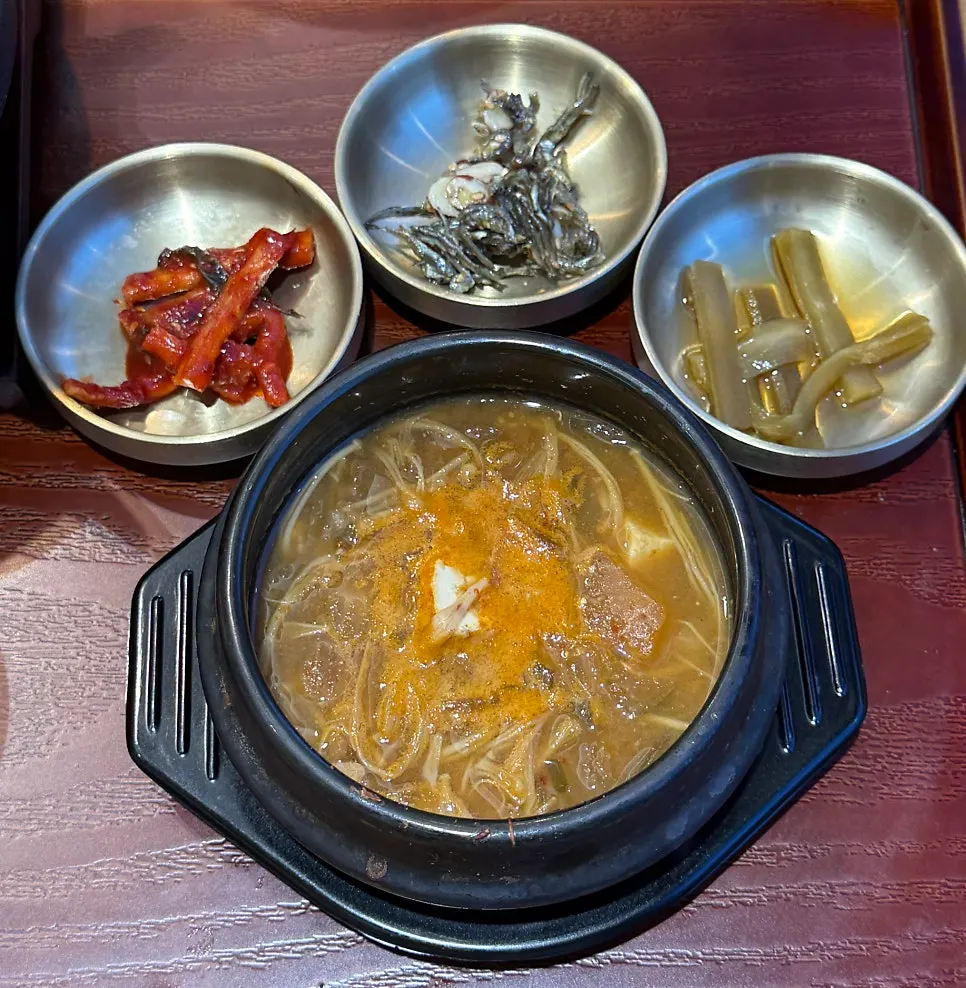 Basic side dishes of pickled radish and stir-fried anchovies with jjigae