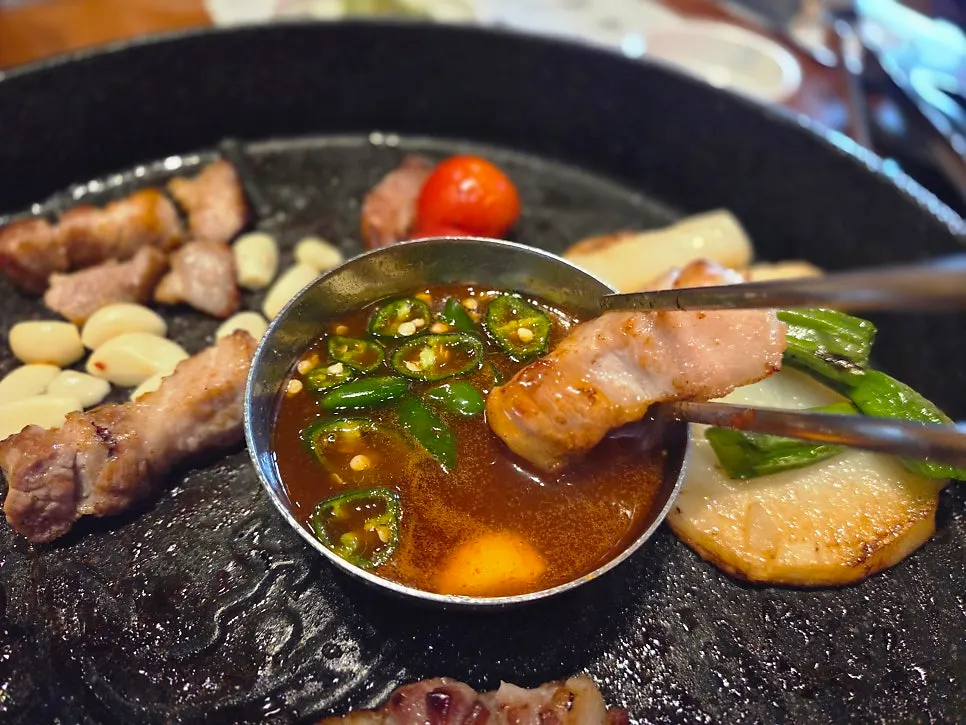 Pork belly served with myeoljeot fermented anchovy sauce