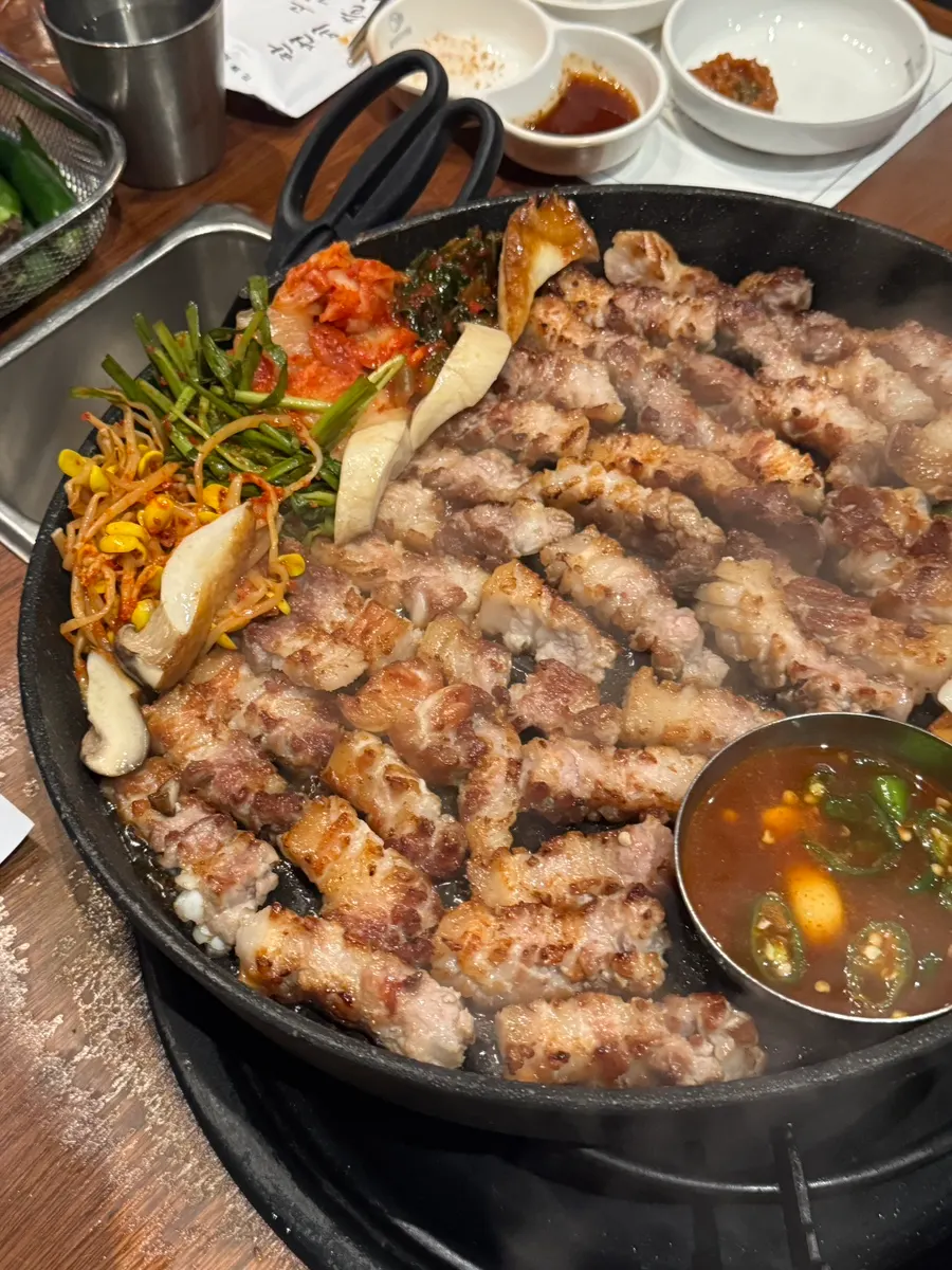 A platter of beautifully browned samgyeopsal