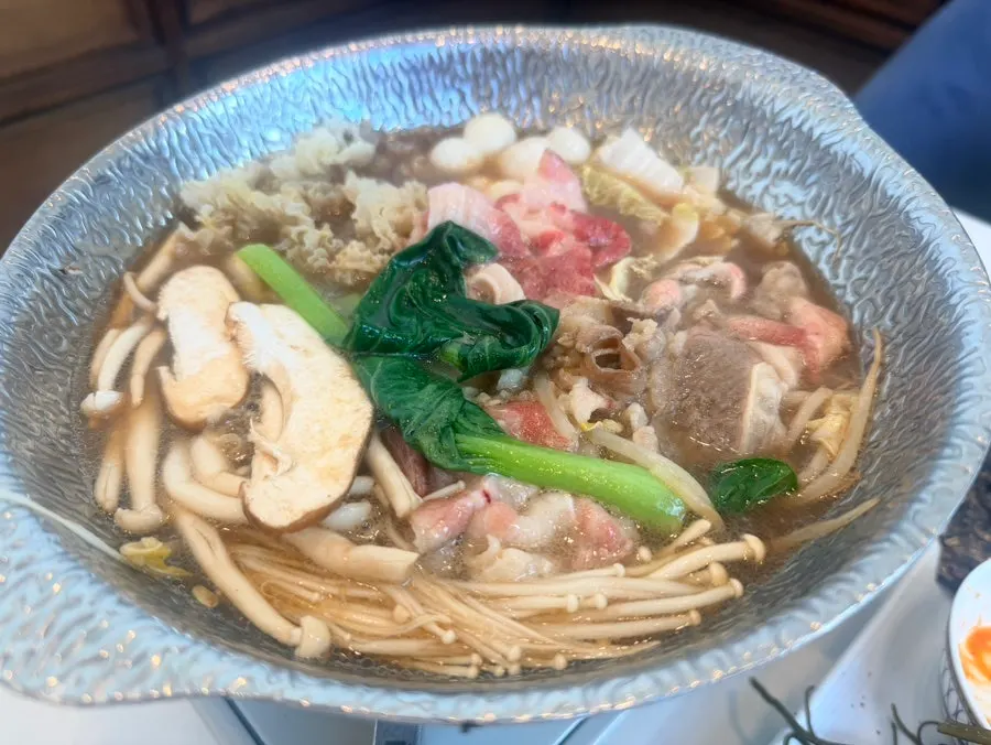 Beef brisket and mushroom hot pot served warm