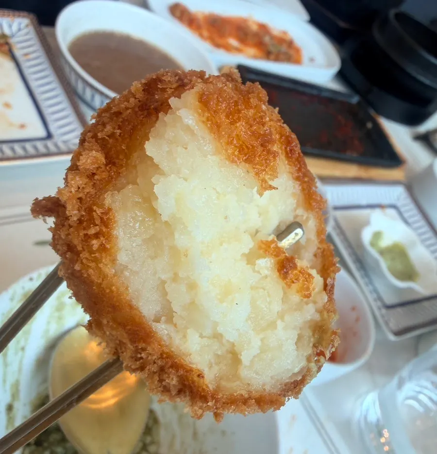 Chewy egg-cheese potato ball from the receipt review event
