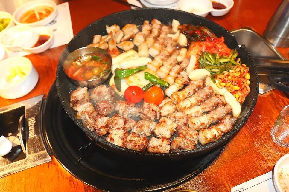 Grill topped with tomatoes and kimchi