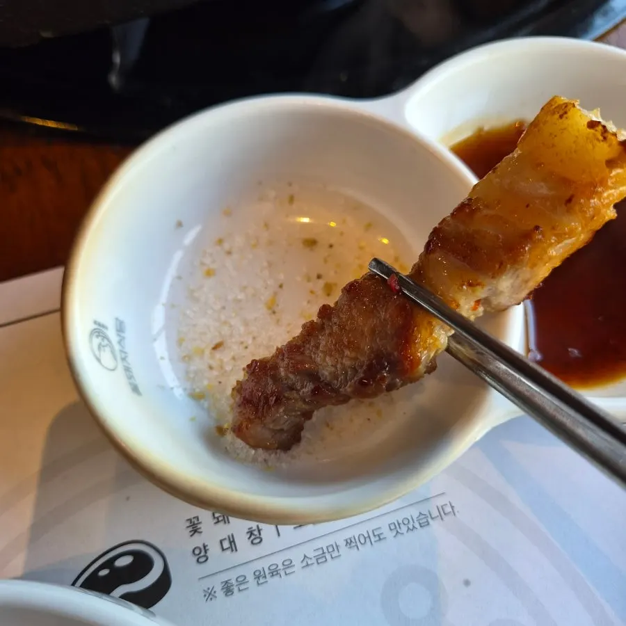 High-fat pork belly picked up with chopsticks