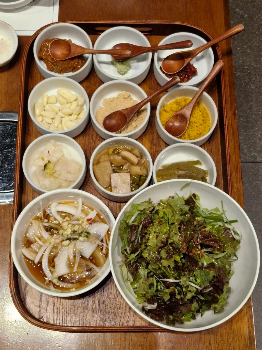 Menu listing pork belly, premium pork neck, gabrisal and hangjeongsal