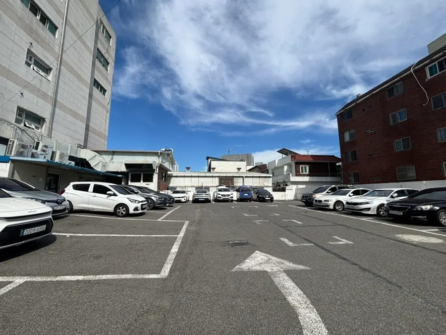 Large parking lot behind the building