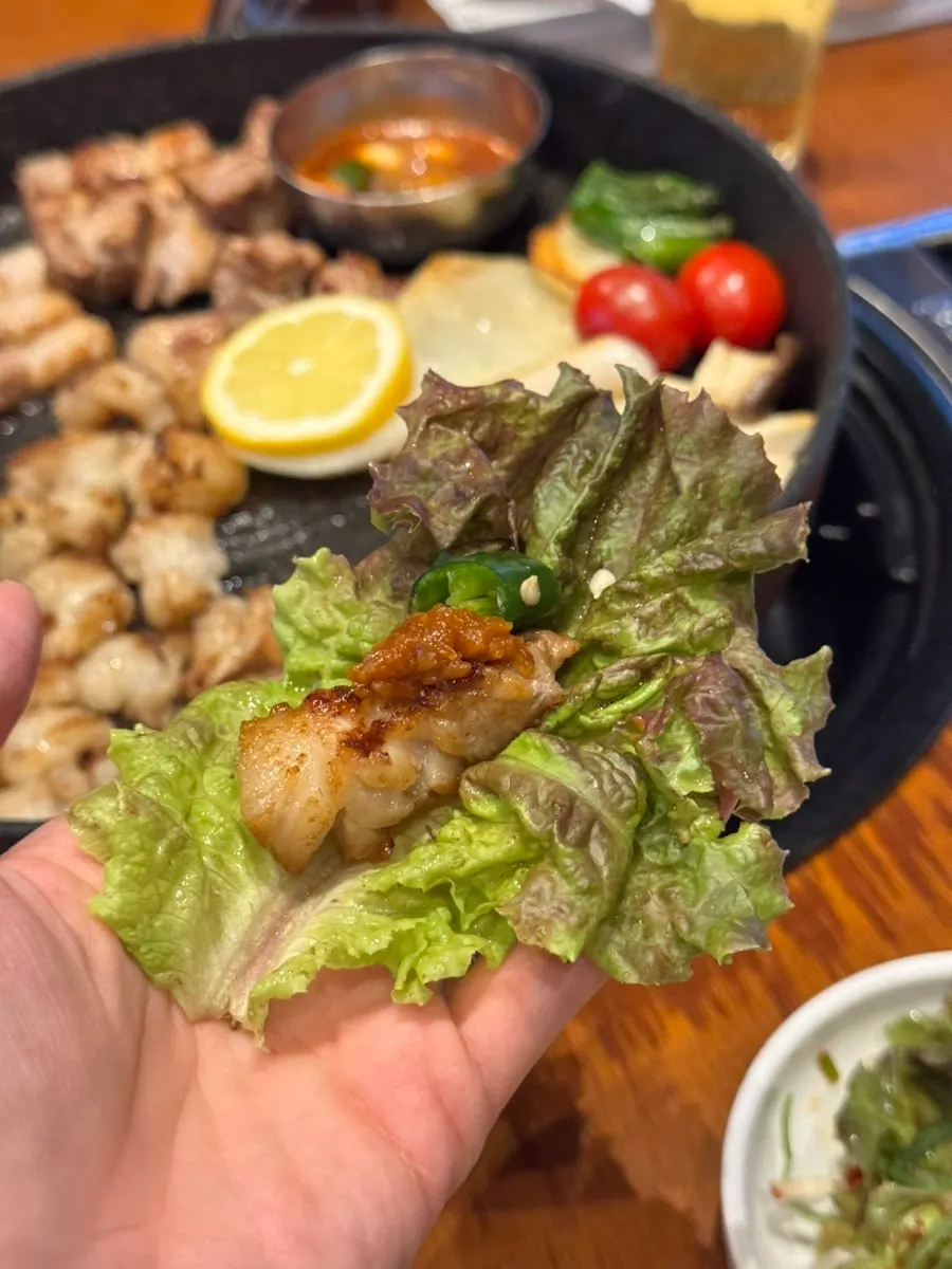 Close-up of pork belly grilled by the staff