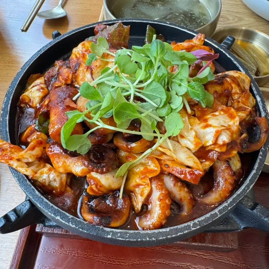 Spicy baby octopus on a personal brazier