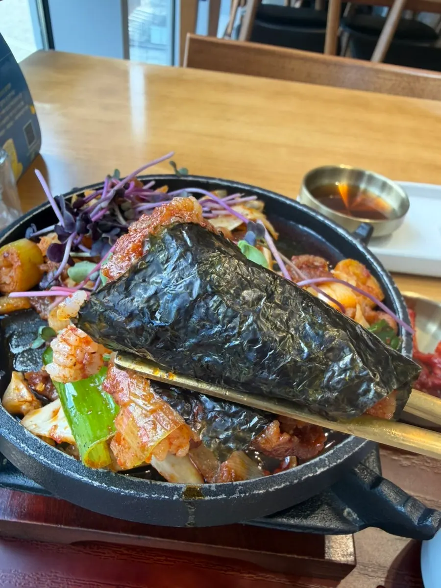 Flame-grilled pork bulgogi wrapped in grilled seaweed