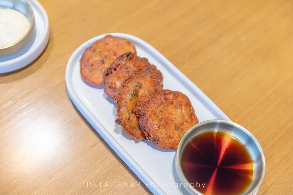 Golden, crispy bite-size kimchi jeon served fresh