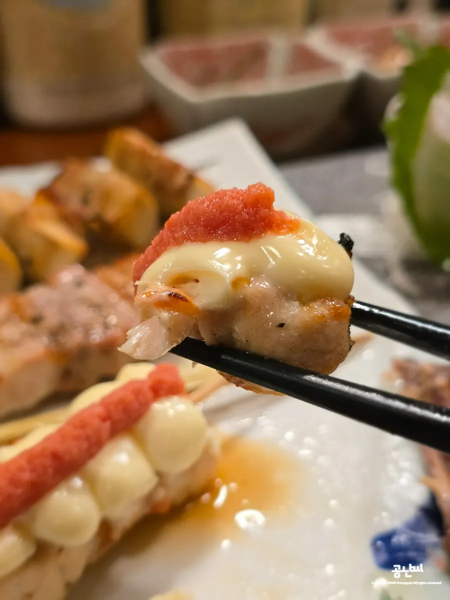 Four assorted skewers including mentaiko mayo chicken and butabara