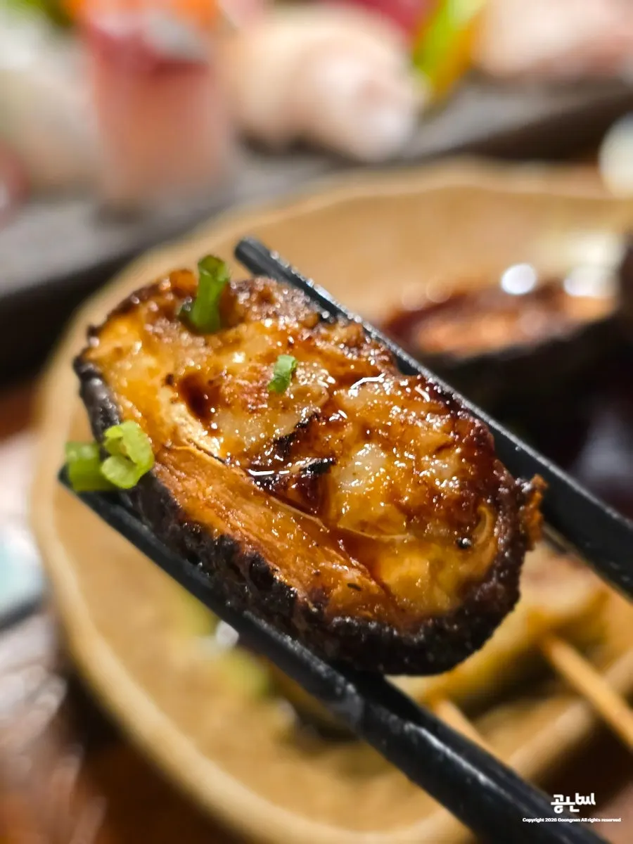 A plate of grilled eggplant at Gyeongseong Sanghoe