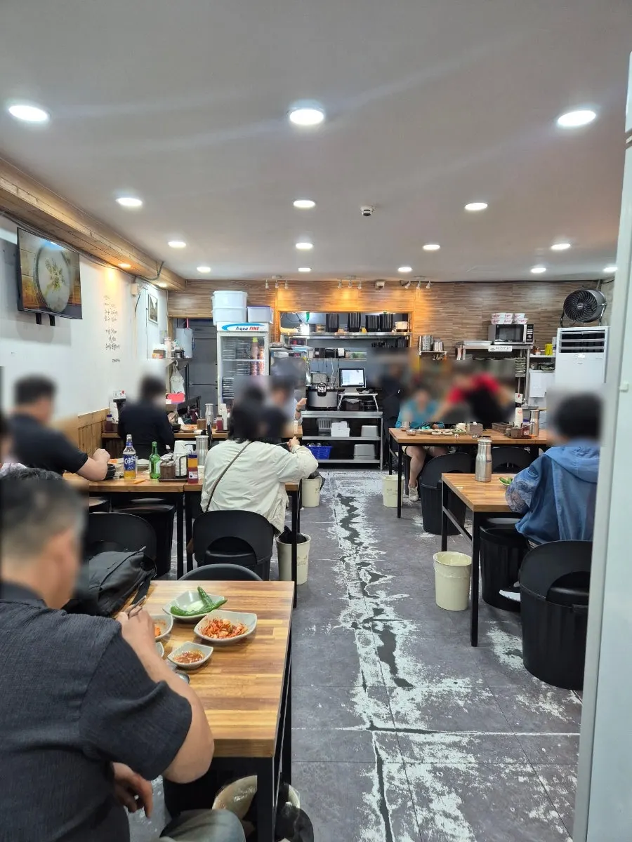 Entrance of the sundaeguk restaurant with a weekday lunch queue
