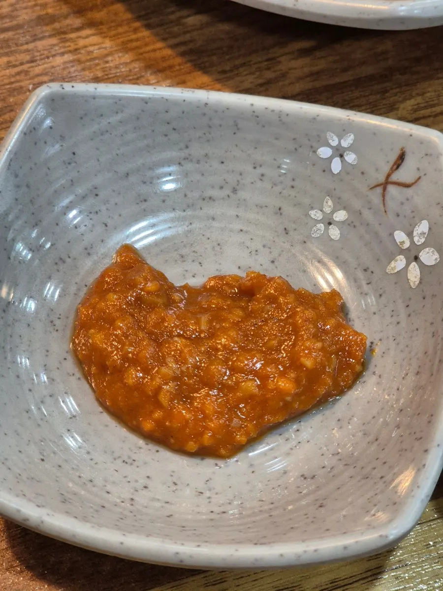 Table condiments including salted shrimp and spicy paste