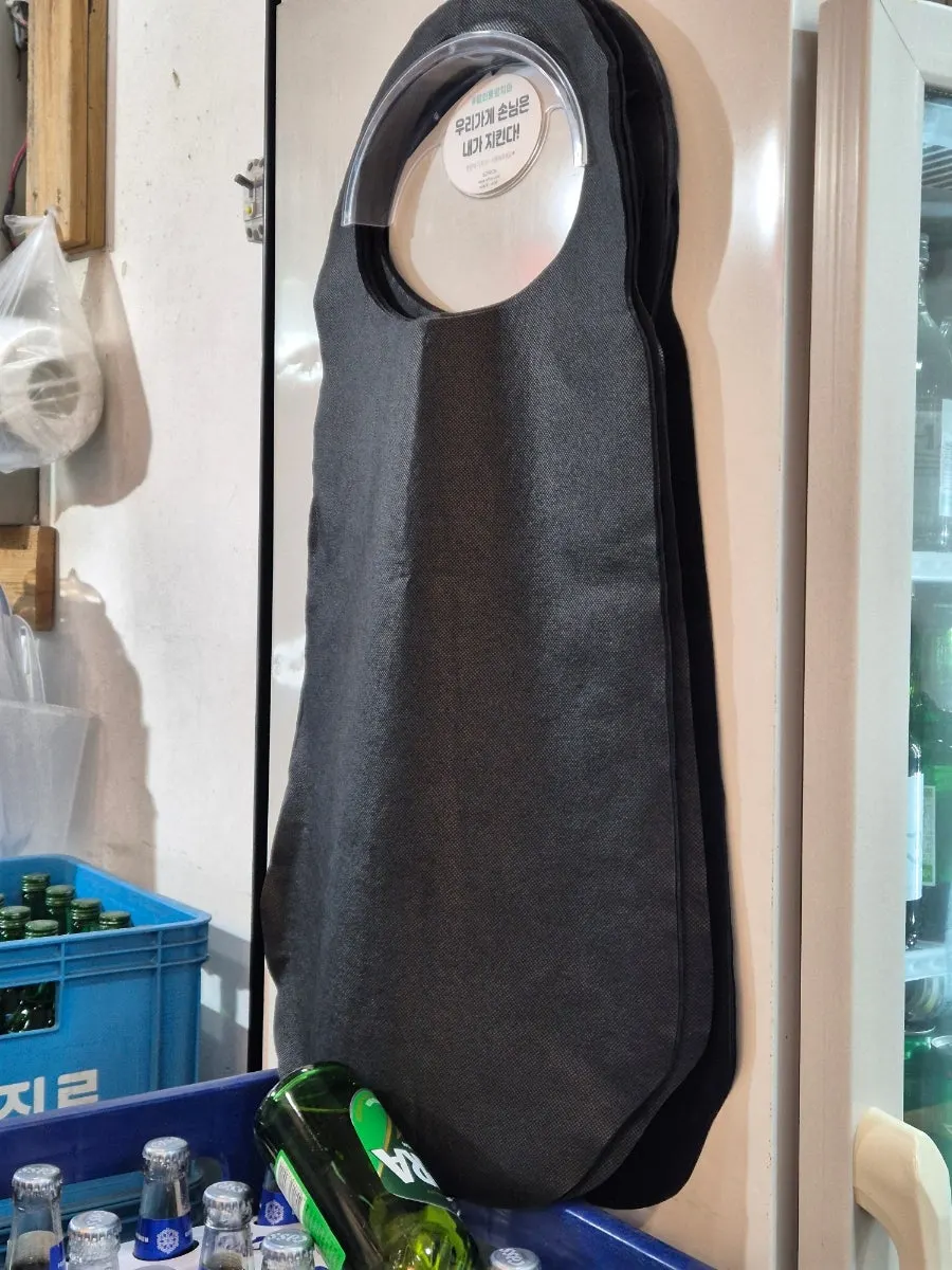 Disposable aprons provided in the restaurant