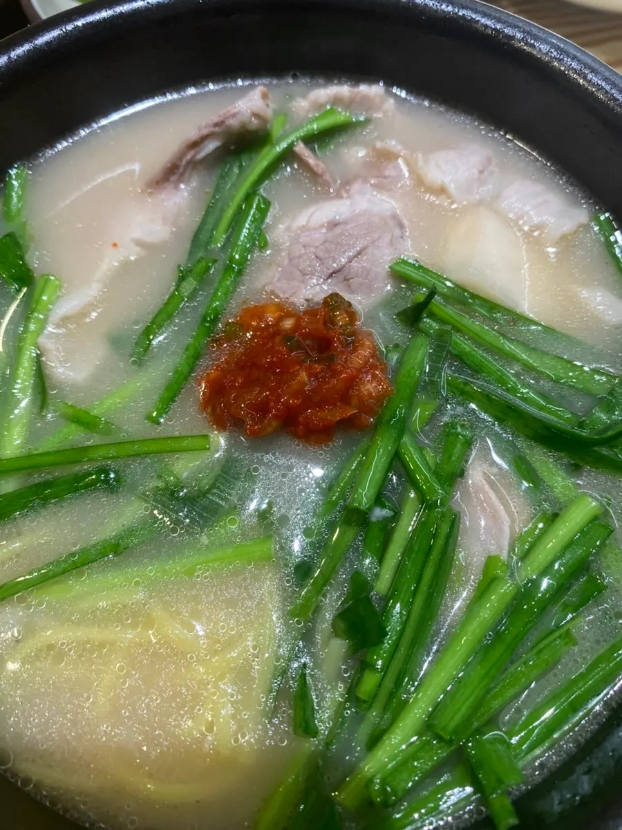 Pork soup with moist noodles added