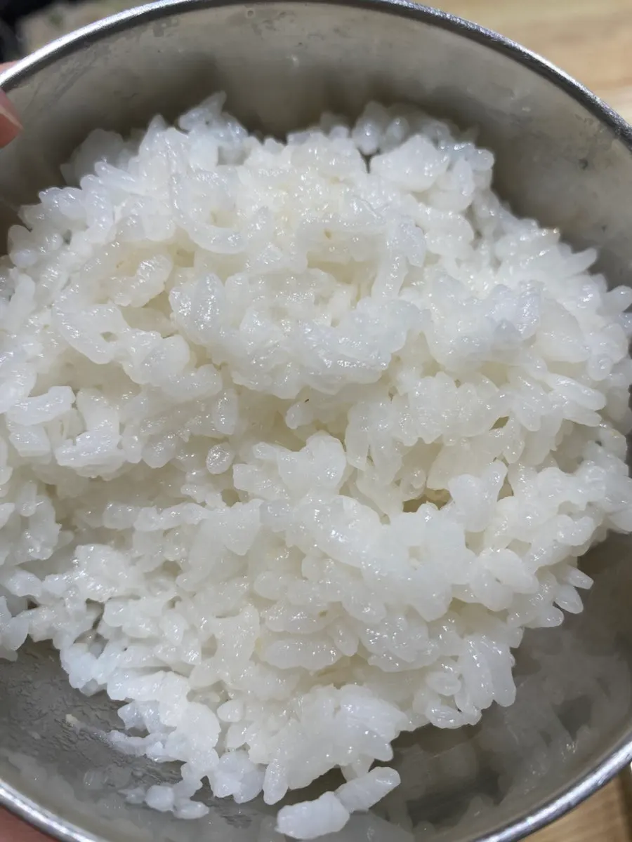 Glossy freshly scooped rice from the rice cooker