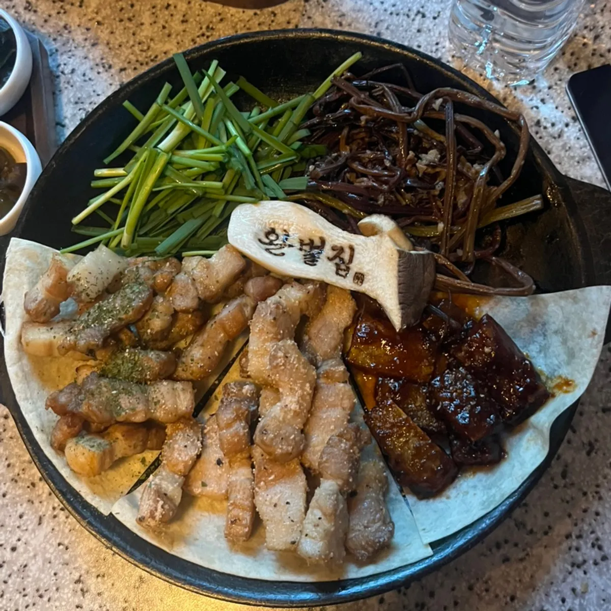 9 side dishes served on one platter