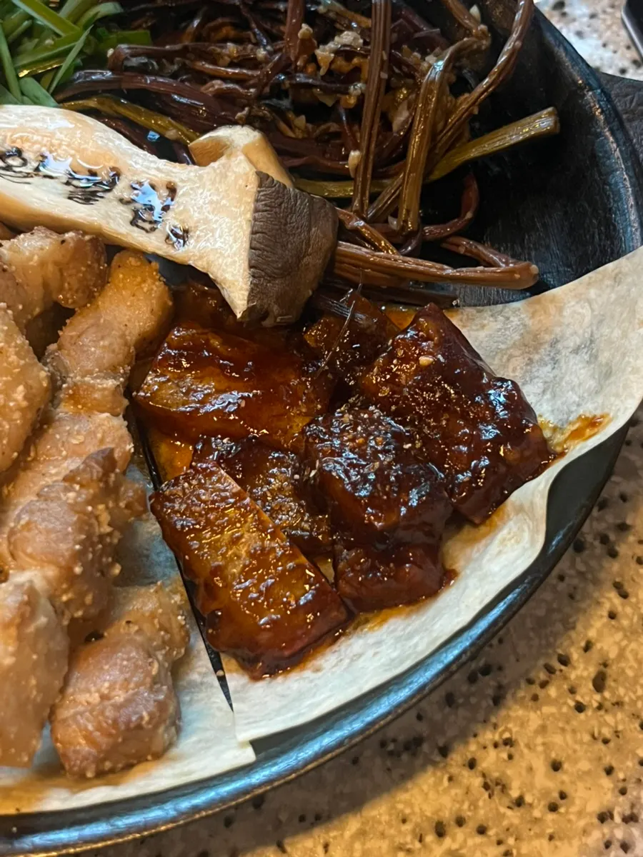 Pollock roe pork belly cooked with the roe still attached