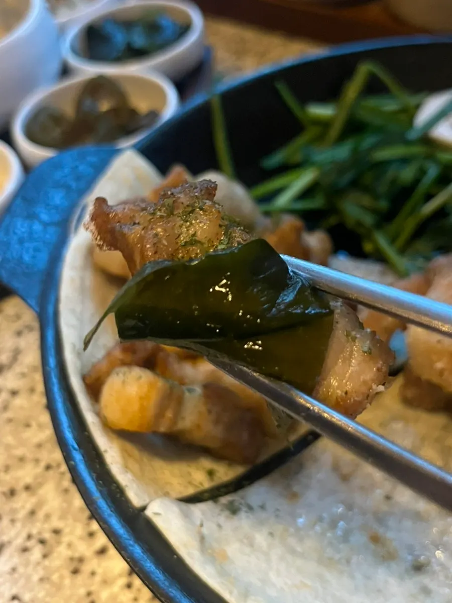 Aged pork belly topped with shiitake wasabi