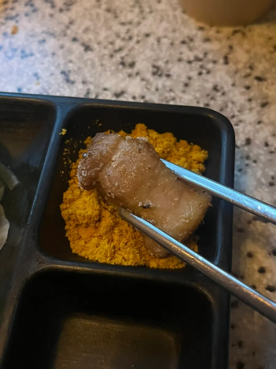 Pork belly served with a sharp hit of wasabi