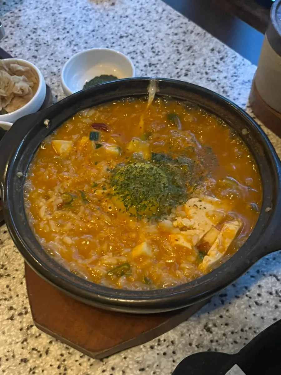 Doenjang risotto served with basil pesto