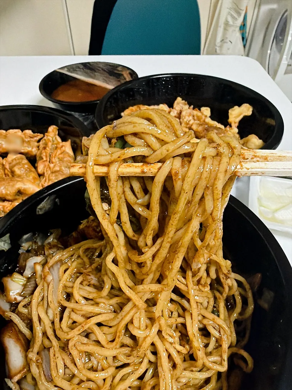 Ganjajang noodles lifted with chopsticks