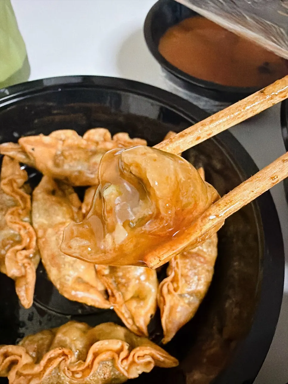 Sweet and sour pork and fried dumplings served together