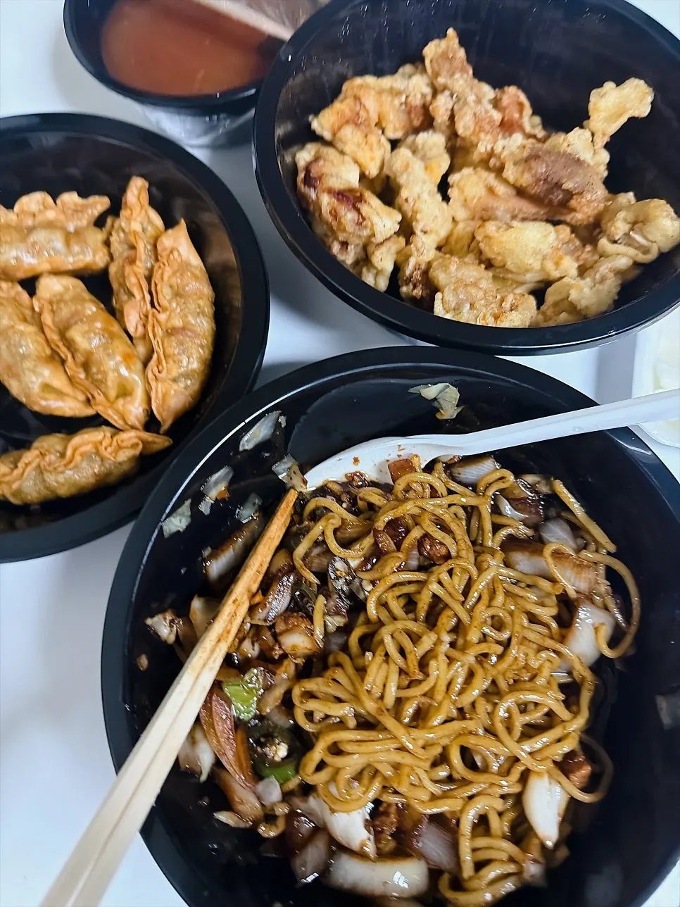 Chinese-style fried rice takeout container set aside