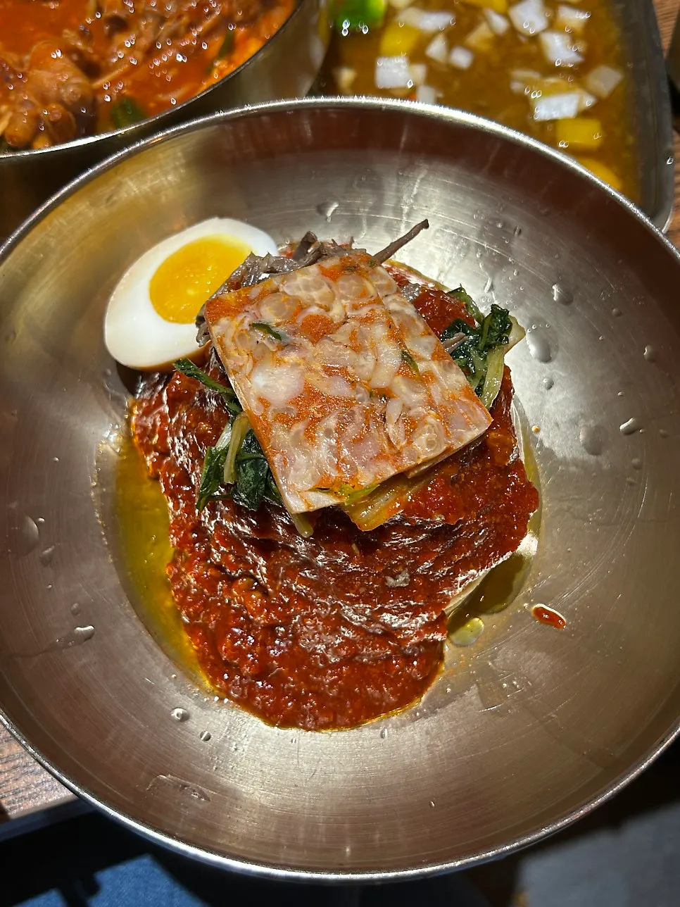 Gyeryugwan's chicken feet soup with rice cake and soft-boiled egg