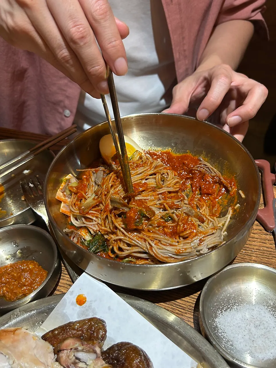 House-made makguksu noodles and toppings
