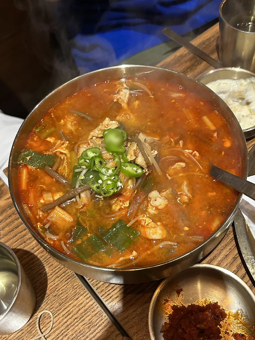 Close-up of makguksu noodles coated in doenjang sauce