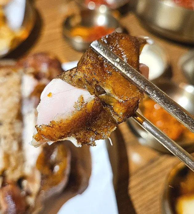 Crispy skin on the fire-roasted chicken
