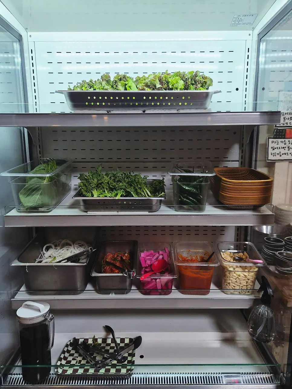 Self-serve bar with lettuce wraps and kimchi at Gyesu Garden