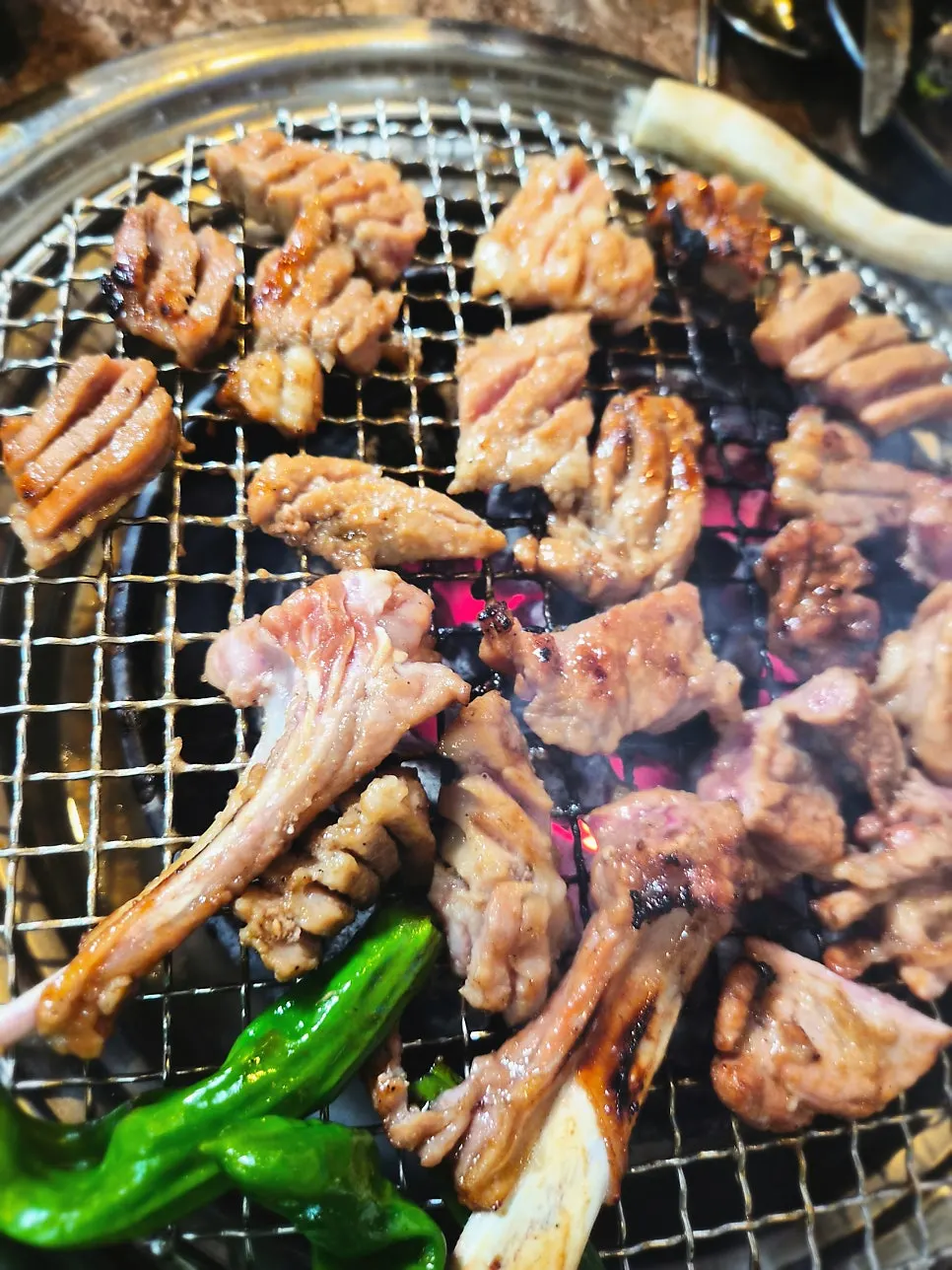 Plate of raw Gyesu Garden pork ribs with tight crosshatch cuts