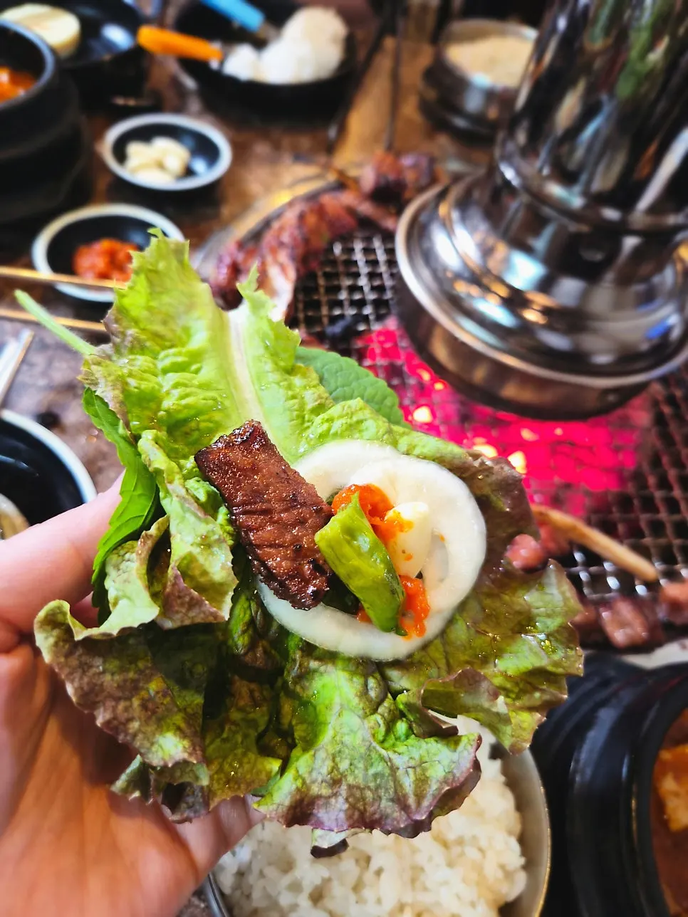 A fully grilled piece of charcoal pork rib