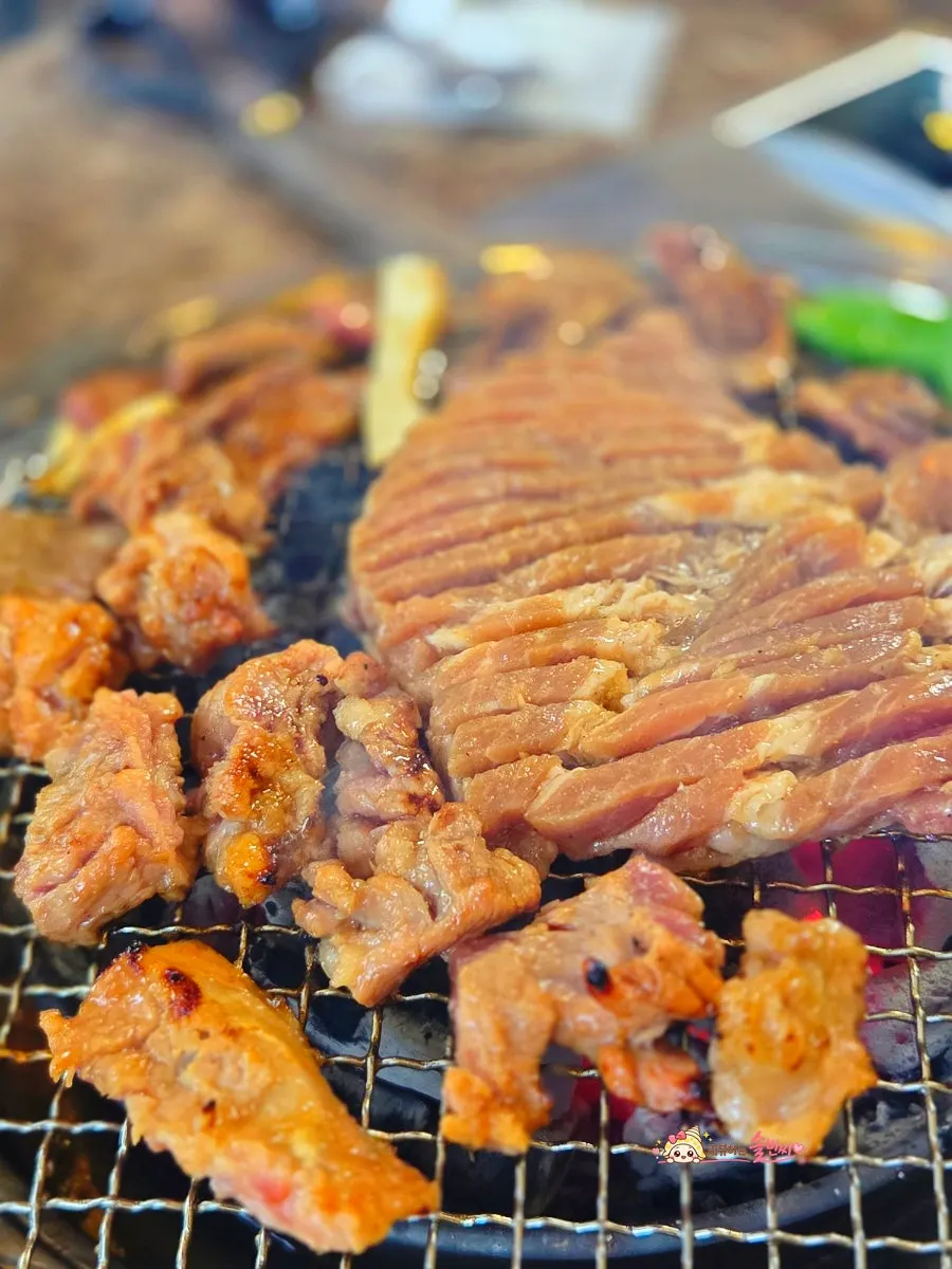 Seasoned pork galbi with a smoky charcoal char