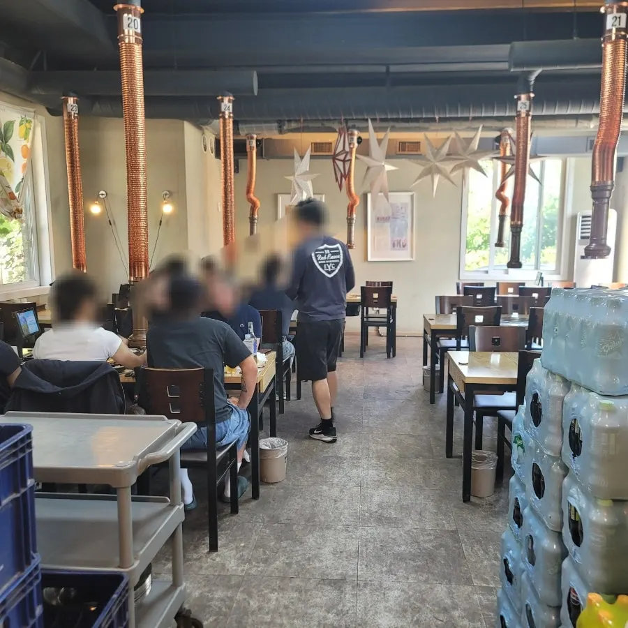 Rows of four-person tables inside Gyesu Garden