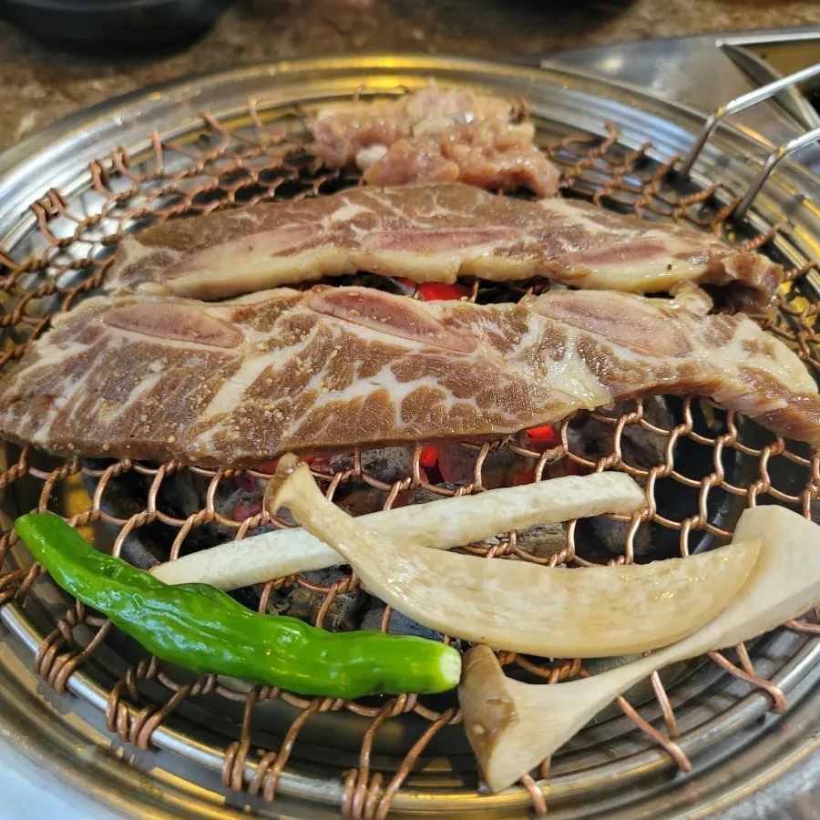 Gyesu Garden's mul naengmyeon topped with fried egg strips