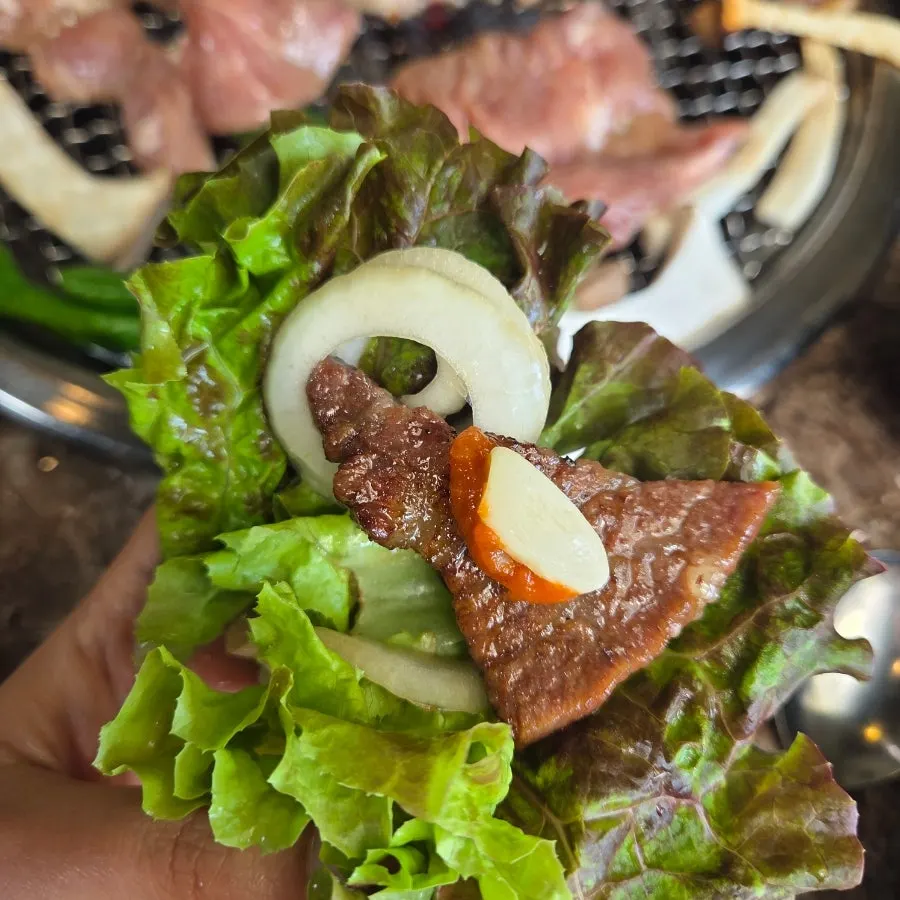 A well-grilled piece of pork galbi