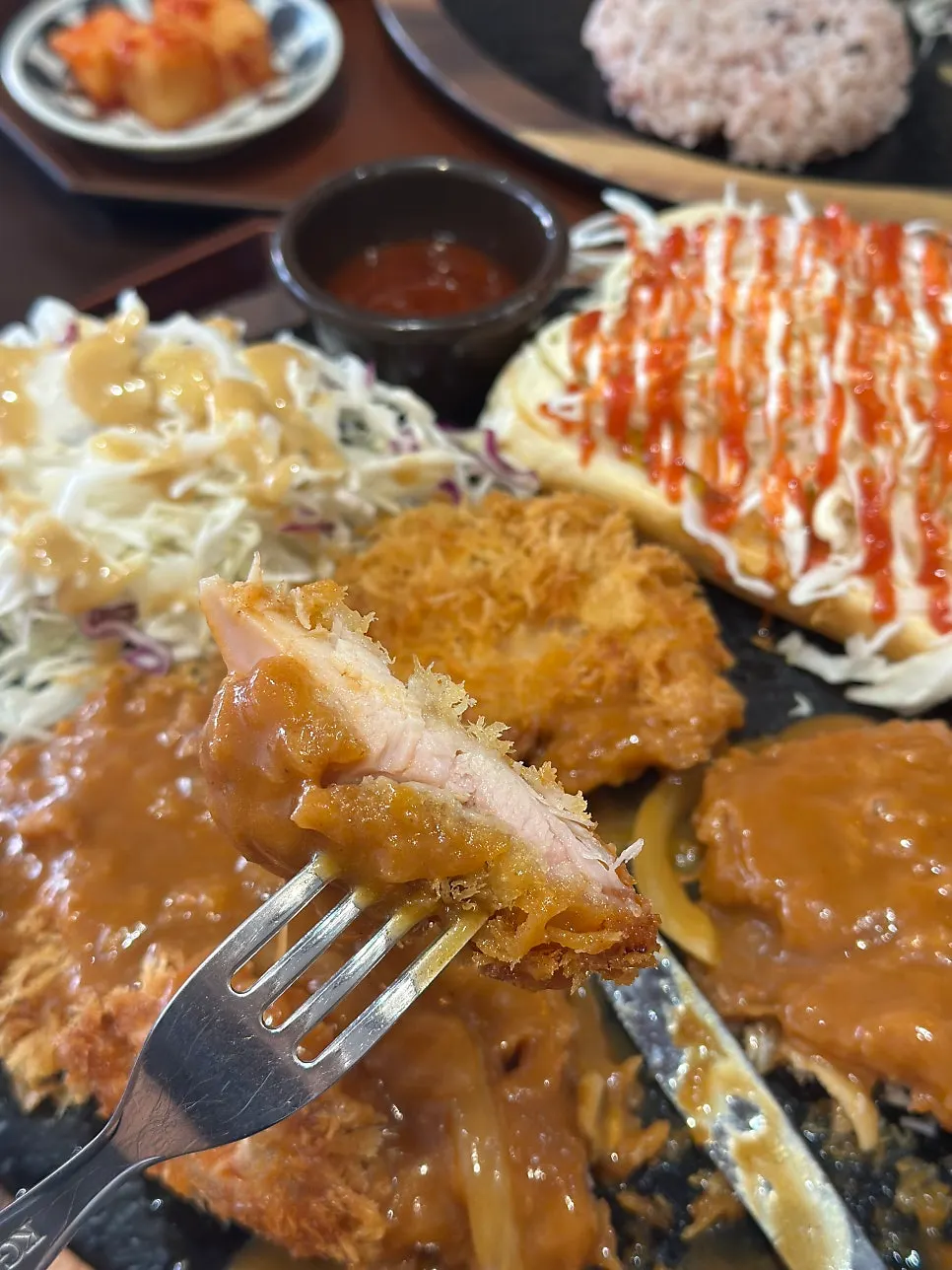 Cross-section of the chicken cutlet showing the thick chicken inside