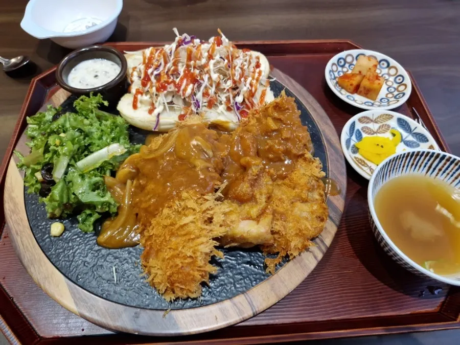 Table filled with soup and side dishes