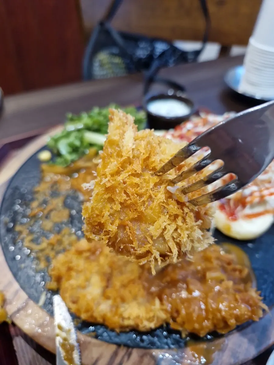 Chicken cutlet paired with spicy sauce